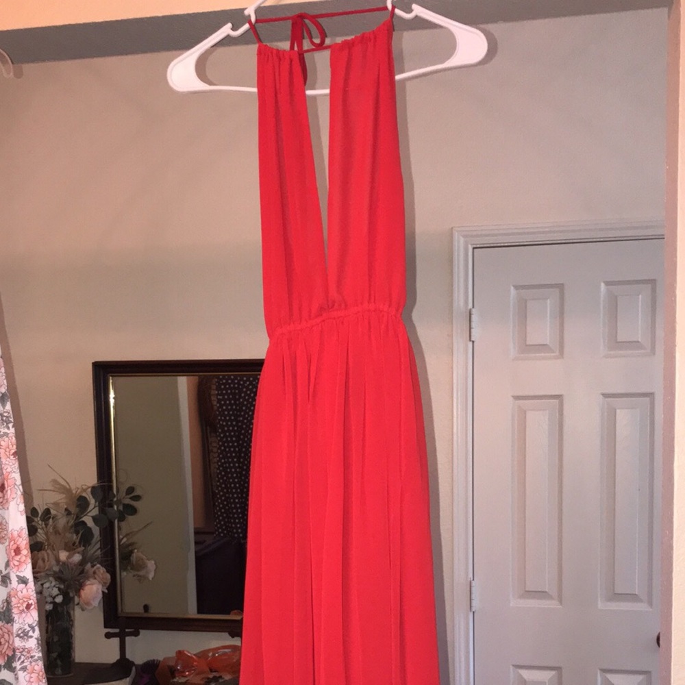 Long evening gown, halter with slit in front.